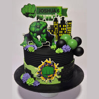 Birthday cake with Hulk-themed decorations on a white background
