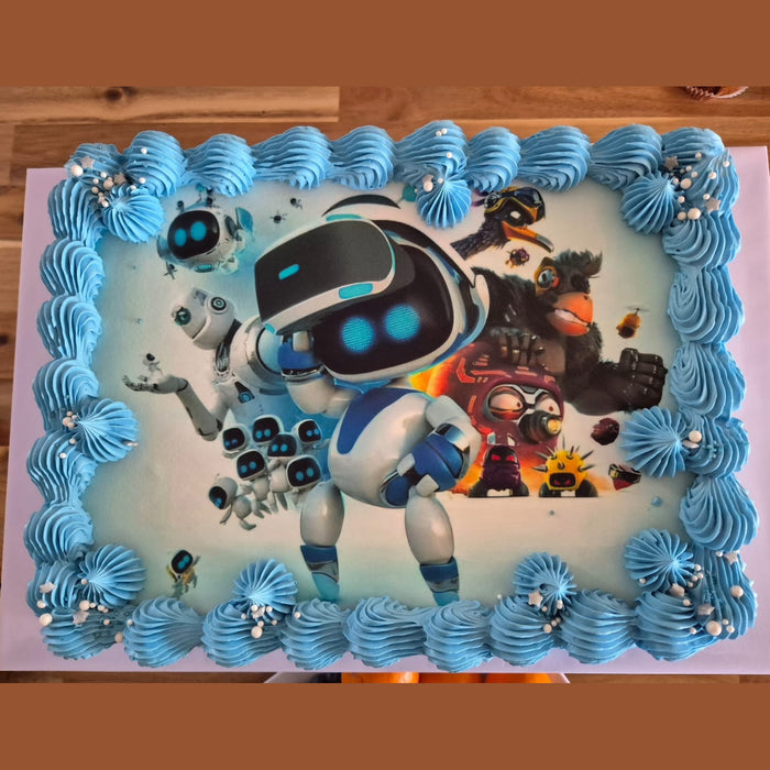 Decorative cake with robot design and blue frosting border